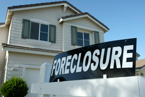 foreclosure sign outside house